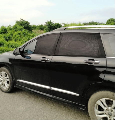 Image of An Genius Temporary Fix for Shading the Kids while Driving